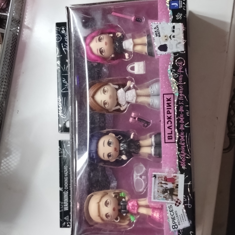 Black pink mini dolls.